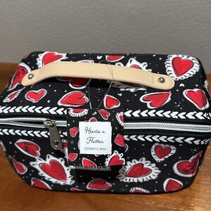 THE BRIGHTON HEARTS A FLUTTER COSMETIC BAG.